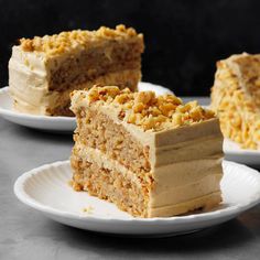 two white plates with slices of cake on them