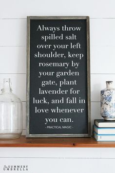 a shelf with books, vases and a sign on it that says always throw spilled salt over your left shoulder