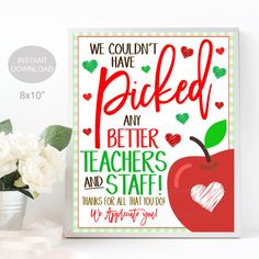 a teacher appreciation card with an apple and hearts on the front, next to a potted plant