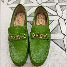 Brad New With Tags Beautiful Green Patent Leather Size 6.5 Green Plain Toe Leather Shoes For Work, Elegant Green Moccasins For Work, Green Round Toe Moccasins For Work, Green Almond Toe Loafers For Office, Elegant Green Plain Toe Loafers, Luxury Green Loafers For Office, Green Leather Flat Loafers, Luxury Green Loafers For Work, Green Slip-on Flats For Formal Occasions