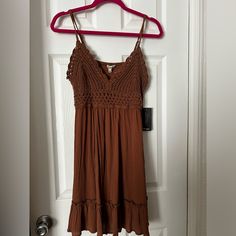 Please Check Out My Store. I Also Have It In A Mustard Yellow Color. Adjustable Spaghetti Strap, Crochet, Top, Ruffle Bottom & Smocked Up Back. Length From Center Back 27” Across Chest All Around 33” Brown V-neck Summer Sundress, Bohemian Brown Dress With Spaghetti Straps, Brown V-neck Mini Dress For Day Out, Casual Brown V-neck Mini Dress, Casual Brown Dress For Vacation, Casual Brown Vacation Dress, Brown Mini Dress With Spaghetti Straps For Beach, Brown Spaghetti Strap Mini Dress For The Beach, Brown Spaghetti Strap Mini Dress For Beach