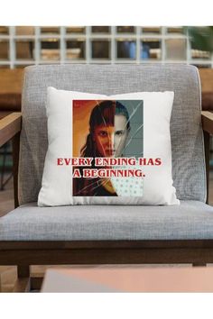 a pillow with the words, every ending has a beginning and an image of jesus on it