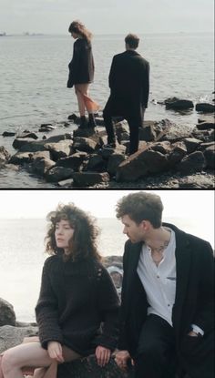 two people sitting on rocks near the water