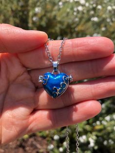 Shiny blue heart locket pendant necklace is a great gift for anyone who loves blue hearts. You can open the heart locket and put photo of your love ones. Carry great memories in a heart pendant necklace wherever you go. Blue Heart Pendant Jewelry Gift For Her, Blue Heart Pendant Jewelry For Mother's Day, Blue Heart-shaped Jewelry For Mother's Day, Personalized Blue Heart Pendant Jewelry, Blue Heart Pendant Keepsake Jewelry, Blue Heart Charm Jewelry As A Gift, Blue Heart Charm Jewelry For Gift, Blue Heart Charm Jewelry As Gift, Blue Heart Charm Jewelry Gift