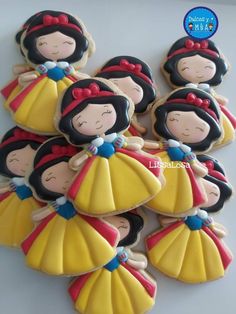 some cookies are decorated like snow princesses