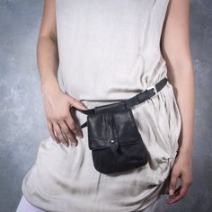 "This Vintage Style Fanny Pack is a small And Unique Hip bag Black Retro Hip Bag simple and beautiful Small fanny pack, it's made from high quality Black Waxed Canvas And Black leather, which is soft to touch, strong, durable and a very fine material. Top grade thicker leather is used for the adjustable long strap belt black leather bag This Retro Style hip bag features one separate compartment closed by a zipper in the back side so you can securely carry passports, cash, phone, and any other va Waxed Canvas Backpack, Black Leather Bag, Black Retro, Waterproof Bags, Unique Bags, Black Leather Belt, Black Leather Bags, Belt Black, Hip Bag