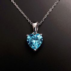 Solid Sterling Silver Blue Topaz December birthstone love heart pendant, with strong Sterling Silver chain. This December Birthstone necklace is the perfect birthday or Christmas gift. Matching earrings available here: https://www.etsy.com/listing/1352816205/ Available to order in gold, white gold, rose gold or platinum, please contact me for prices.  💎Pendant thickness: 6mm 💎Pendant width: 9mm 💎Pendant overall Length: 17mm 💎Chain length: 18 inch or other length if required.  ✨ For free give Sapphire Heart Pendant Jewelry As Gift, Sapphire Heart Necklaces For Anniversary, Sapphire Heart Necklace For Anniversary, Gift Heart Cut Gemstone Birthstone Necklace, Heart-shaped Sapphire Necklace For Anniversary, Blue Gemstone Heart Necklace For Gift, Heart Cut Gemstone Birthstone Necklace Gift, Sapphire Necklace For Valentine's Day Gift, Heart Cut Heart Charm Jewelry For Birthday Gift