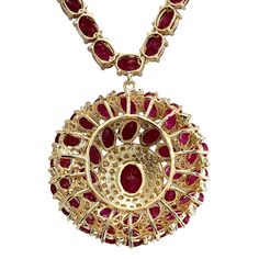 For Sale on 1stDibs - Stamped: 18K Yellow Gold Total Necklace Weight: 29.0 Grams Necklace Length: 17 Inches Necklace Width: N/A Gemstone Weight: Total Natural Center Ruby Weight