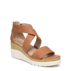 For your easy-going summery style. Crisscross straps complete the vamp of this ultra-comfy minimal sandal from SOUL Naturalizer. Elevated by a cork trim wedge and white lug bottom it’s a wear-everywhere style. Inspired by the way you live.Sport sandal with layered wedge heel and crisscross straps. Manmade upper with an open toe. Back zip closure. All-Thru Comfort: soft foam lining arch support with memory foam antimicrobial sock lining lightweight and flexible outsole. Lug sole. 2 3/4" heel. Con Wide Width Sandals, Trending Sandals, Ankle Strap Wedges, Footbed Sandals, Strappy Wedges, Famous Footwear, Shoe Carnival, Jelly Sandals, Round Toe Heels