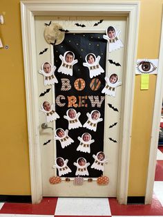 a door decorated with halloween decorations and pictures