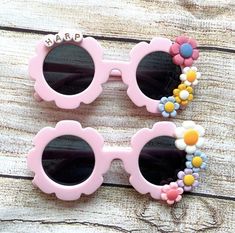 Add a little jazz and pizazz to the spring & summer with these personalized flower sunglasses for kids. They are perfect for gifting, pretend play, party favors & more. These measure approximately 4.7in and are a great fit for kids ages 2-7. 100% UV Protection Please choose style and provide name you would like on the glasses in the personalization box. For best look, we recommend 9 letters max. Please Note: 1. Please be aware that colors may vary based on your monitor/phone screen you are using Sunglasses For Kids, Flower Sunglasses, Kids Sunglasses, Phone Screen, Pretend Play, Pink Flower, Eyewear Sunglasses, Uv Protection, Sunglasses Accessories