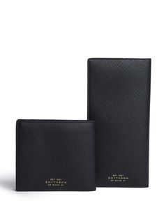 Find SMYTHSON Panama Bi-fold Leather Wallet on Editorialist. jet black calf leather grained texture bi-fold design square shape gold-tone logo lettering internal card slots internal flap pocket internal slip pocket Designer Black Saffiano Leather Wallets, Classic Saffiano Leather Travel Wallet, Classic Black Saffiano Leather Wallet, Saffiano Leather Business Wallet, Black Saffiano Leather Wallet For Everyday Use, Classic Saffiano Leather Wallets With Rfid Blocking, Classic Saffiano Leather Wallet With Rfid Blocking, Rectangular Saffiano Leather Business Wallet, Classic Rectangular Saffiano Leather Wallet