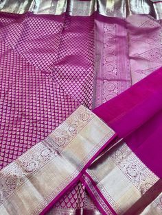 Introducing the timeless Magenta zari brocade pure Kanchipuram silk saree. Boasting a traditional, motif-free body, complimented by a stunning gold zari border with silver highlights and an opulent & luxurious pallu. This saree is the ultimate in wedding fashion and sophistication. Comes with stitched blouse size 38-46 This saree is ready to wear with fall and pico done.  SILK MARK CERTIFIED Transitional Tissue Silk Traditional Wear, Traditional Tissue Silk Blouse Piece With Zari Weaving, Blouse Piece With Zari Weaving For Traditional Ceremonies, Blouse Piece With Zari Weaving For Transitional Traditional Ceremonies, Traditional Tissue Silk Blouse With Self Design, Handloom Blouse Piece For Wedding And Transitional Seasons, Diwali Lehenga In Tissue Silk With Traditional Patterns, Transitional Wedding Handloom Blouse Piece, Elegant Paithani Silk Blouse Piece With Zari Weaving