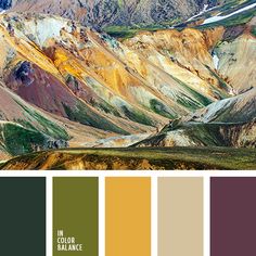 the mountains are covered in different shades of green, yellow and brown color palettes