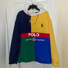 Nwot Limited Edition Men’s Pullover Multi Colored Lightweight Jacket Polo Ralph Lauren 1967 Hidden Middle Pocket 100% Nylon Sporty Long Sleeve Patchwork Outerwear, Long Sleeve Nylon Outerwear With Patchwork, Color Block Long Sleeve Outerwear For Streetwear, Color Block Long Sleeve Streetwear Outerwear, Nylon Long Sleeve Sport Coat For Streetwear, Nylon Sport Coat For Streetwear, Multicolor Nylon Outerwear For Fall, Multicolor Long Sleeve Nylon Outerwear, Fall Multicolor Nylon Outerwear