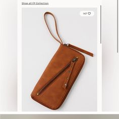 Free People Nwt Vegan Tan Leather Is Excellent Condition. Better Be Has Never Been Used. Has Grommets On Zipper Pull. Free Awesome Gift With Every Purchase. *Gift Value Based On Purchase Price Thank You For Looking Any Questions Please Ask Casual Clutch With Zipper Closure For Everyday Use, Casual Everyday Clutch With Zipper Closure, Casual Everyday Clutch Wristlet, Brown Wristlet With Zipper For Everyday Use, Brown Wristlet With Zipper Closure For Everyday, Casual Wristlet With Zipper Closure For Everyday Use, Everyday Brown Wristlet With Zipper Closure, Casual Everyday Wristlet With Zipper Closure, Casual Wristlet With Zipper Closure