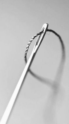 a pair of scissors sitting on top of a table