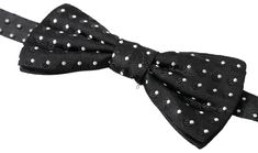 Step into a world of timeless elegance with this exquisite Dolce & Gabbana silk bow tie, perfect for the discerning gentleman. Crafted in Italy, it features an adjustable neck strap ensuring a seamless fit for any special occasion. The attached metal clasp, in the form of a discrete hook, adds a touch of sophistication while providing convenience. This tie is a must-have accessory that embodies the luxurious aura of Dolce & Gabbana’s exclusive collection. Color: Black Material: 100% Silk Adjusta 50's Costume, Silk Bow Ties, Neck Bow, Silk Bow, Sweaters And Jeans, Neck Strap, Black Polka Dot, Dolce & Gabbana, Black Silk