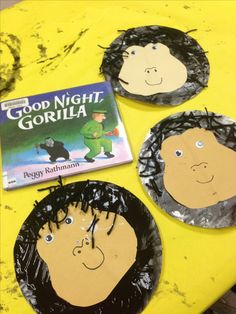 three paper plates with children's faces on them and a good night gorilla book