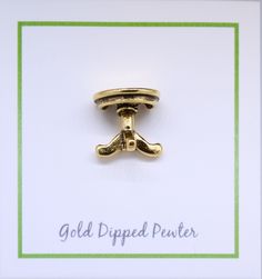 Table Gold Lapel Pin Historic drawings of Ancient Greece that depict banquets show diners having a single small table each, rather than collectively using a large table. Our table pin is hand cast in solid, lead-free pewter and then dipped in gold. The furniture pins have a US made, military style clasp back to keep your pin secure on a coat, hat, or bag. All dining room pins arrive packaged on our signature presentation cards, making them ready for gift-giving! 5/8" x 9/16", 16mm x 14mm Hand ca Historic Drawings, Presentation Cards, Cards Making, Family Crafts, Large Table, Small Table, Military Style, Hand Cast, Ancient Greece