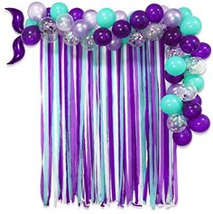 purple and teal balloon garland with balloons on the side for a mermaid themed birthday party