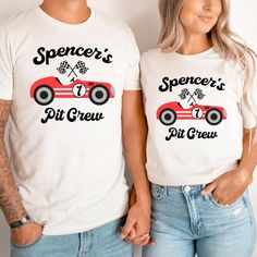 two people wearing matching shirts that say pit crew, pit crew, and daddy mommy