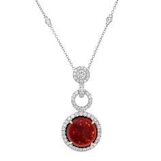 This Glamorous Juleve Inspired 18 Karat White Gold Necklace features a Spectacular 4.80 Carat Cabochon Natural Fire Opal. The Gorgeous Opal is accompanied by 0.95 Carat Total Weight Round Diamonds in the Drop Halo & Diamonds by the Yard Chain. The Necklace is 18 inches in length. This One of a Kind Piece was Designed and Proudly Manufactured in U.S.A. Diamond By The Yard, Diamonds By The Yard, Custom Diamond Rings, Halo Necklace, High Jewellery, Solitaire Rings, White Gold Necklace, Pendant Diamond, Fancy Necklace