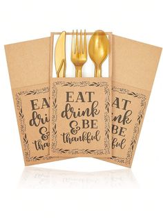 three forks and two spoons in a cardboard box with the words eat drink be grateful on it