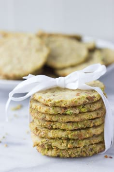 a stack of cookies sitting on top of a white plate