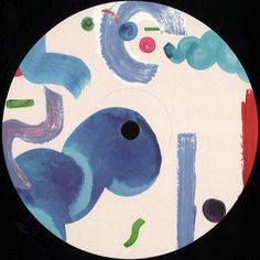 an abstract painting on a white disc with blue and green paint splattered all over it