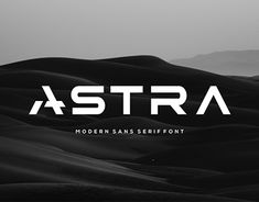 black and white photo of desert with the word astra on it