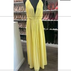 Look Like A Goddess In This Chiffon Dress. Yellow Halter Dress New With Tags Long Open Back Zipper Closure On Back Armpit To Armpit: 19" Total Length: 60" (From Top To Bottom Hem) Size: Large (Non Stretchy) Self: 100% Polyester Lining: 100% Polyester Lined V-neck Sundress For Date Night, Summer Flowy Maxi Dress For Party, Summer Party Maxi Dress Flowy Style, Summer Party Flowy Maxi Dress, V-neck Lined Sundress For Date Night, Spring Summer Maxi Dress For Night Out, Spring Maxi Dress For Night Out, Spring Summer Sundress For Night Out, Summer Pleated Mini Dress For Party