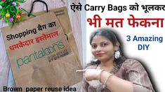 a woman pointing at a brown paper bag with the words shopping bags written in english