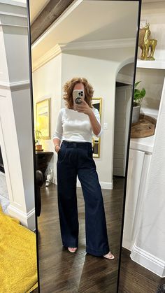 This wide leg pair features a dark denim wash with trendy front pleats and a wide leg, offering a casually elegant silhouette with soft volume. A 100% cotton fabrication and an elastic cinched waist makes these pants effortlessly comfortable. How It Fits High Rise | Wide Leg 13" front rise 16" back rise 23" knee 22.5" leg opening 100% Cotton (no stretch) Made in Turkey Cathleen is 5'4" wearing a 27 (4) Casually Elegant, Sweater Blazer, Denim Trousers, Cinched Waist, Dark Denim, Blazer Coat, Hat Hairstyles, Denim Wash, Denim Pants