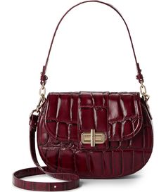 From the Nerina Collection by BRAHMIN&#x2C; the Merlot Cynthia Shoulder Bag features:From BRAHMIN&#x2C; this handbag features:LeatherFlap turn-lock closureFlat shoulder strapAdjustable crossbody strapBack slide in pocketSingle kangaroo pocketInterior zip pocketKey clipApprox. 10.5" W x 7.25" H x 2.5" DImported. Elegant Red Saddle Bag With Gold-tone Hardware, Luxury Saddle Bag With Silver-tone Hardware, Luxury Red Saddle Bag For Formal Occasions, Elegant Red Saddle Bag For Formal Occasions, Leather Inlay, Key Clip, Bag Design, Slide In, Merlot