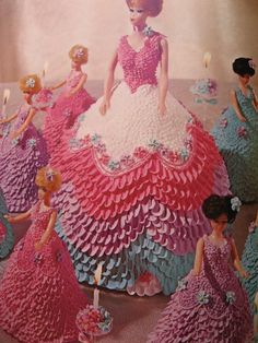 an advertisement for barbie's birthday cake with the image of princesses in pink and blue dresses