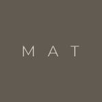 the word mat is written in white on a gray background