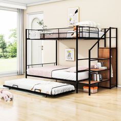 a bunk bed sitting on top of a hard wood floor