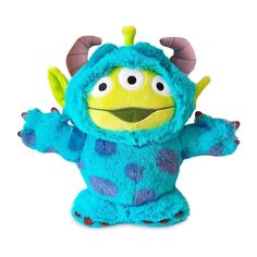 a blue and green stuffed animal with horns on it's head, arms outstretched