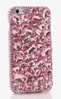 a pink phone case with lots of diamonds on it