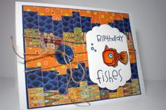 a birthday card with an orange fish on it