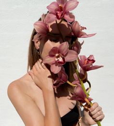 a woman with flowers in her hair