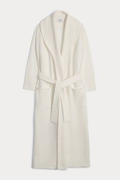 Wrap yourself in the warmth of the Yasmin robe. Made out of super soft cashmere, this robe is a lounging essential. 766 grams of 100% pure cashmere in 5-gauge knit Cashmere robe Shawl collar Tie front Patch pockets at front Ribbed trim 41" length (size small) Dry Clean Only Luxury Chic Loungewear Robe, Luxury Classic Robe For Loungewear, Luxury Loungewear Robe With Tie Waist, Cashmere Robe Women, Luxury Black Robe For Loungewear, Cashmere Robe, Beautiful Wardrobe, Ecru Color, Night Wear