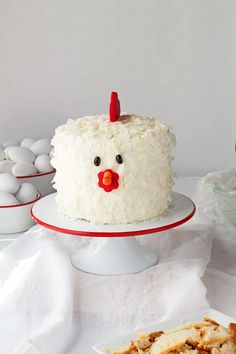 there is a cake that looks like a chicken on the table