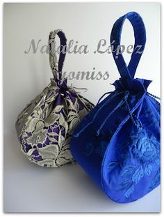 two bags with blue and silver designs on them