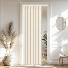 an open door with vertical blinds in a white room next to a chair and potted plant