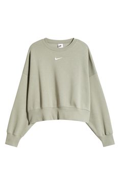 An embroidered Swoosh adds minimal branding to this cozy fleece sweatshirt cut for a relaxed, oversized fit that's enhanced by the dropped shoulders. 22" length (size Medium) Crewneck 80% cotton, 20% polyester Machine wash, tumble dry Imported Cute Nike Sweaters, Vintage Nike Sweatshirt Cream, Nike Crew Neck Vintage, Etsy Nike Sweatshirt, Cute Sweatshirts For Women, Nike Sweatshirts Aesthetic, Cute Sweatshirts For Teens, Things To Add To Your Wishlist, Christmas Wishlist Items