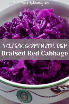 a bowl filled with red cabbage on top of a table