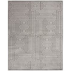 a gray rug with squares and lines on it