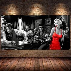 a black and white photo of people at a bar with a woman in a red dress